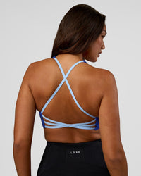 Woman wearing Stellar Sports Bra - Power Cobalt | Model:Kirstyn | Size:S | Thumbnail Index: 1