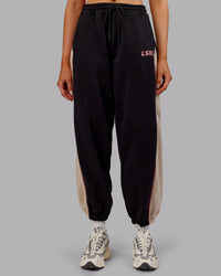 Woman wearing Stitch Up Fleece Sweat Pant - Black/Shale Beige | Model:Ella | Size:S | Thumbnail Index: 0
