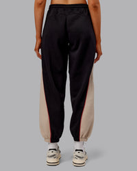 Woman wearing Stitch Up Fleece Sweat Pant - Black/Shale Beige | Model:Ella | Size:S | Thumbnail Index: 3