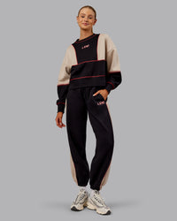Woman wearing Stitch Up Fleece Sweat Pant - Black/Shale Beige | Model:Ella | Size:S | Thumbnail Index: 4