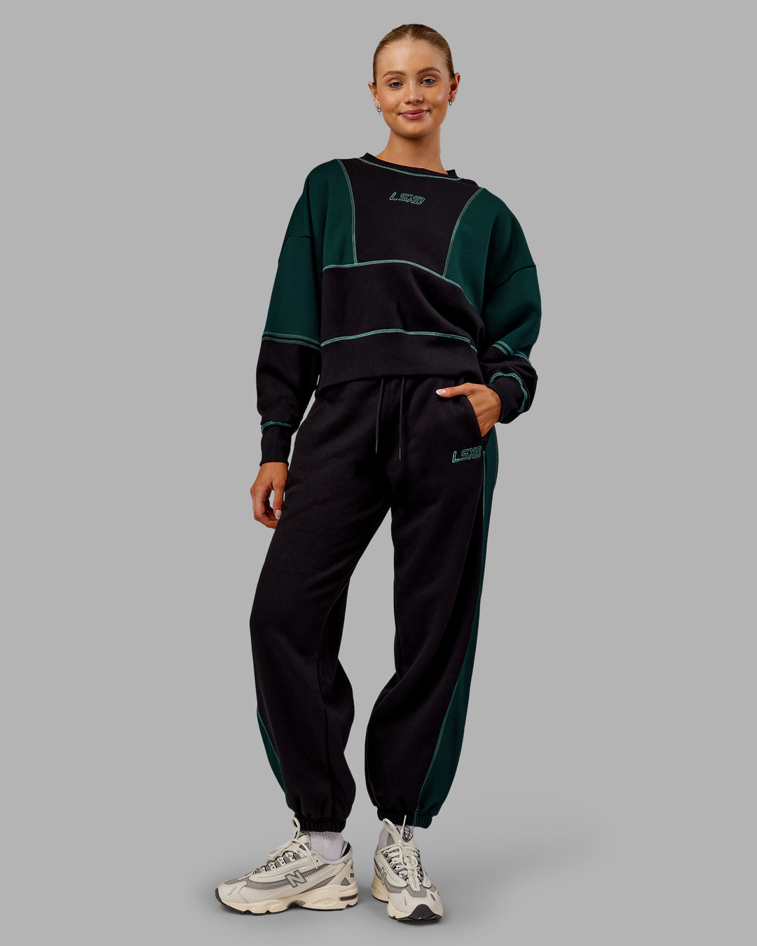 Woman wearing Stitch Up Oversized Fleece Sweater - Black-Dark Moss | Model:Ella | Size:S - view 6