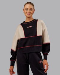 Woman wearing Stitch Up Oversized Fleece Sweater - Black-Shale Beige | Model:Ella | Size:S | Thumbnail Index: 7