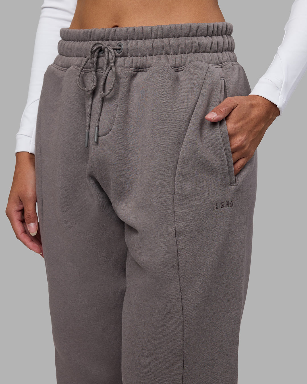 Woman wearing Stream Panel Track Pants - Storm Front | Model:Rhiley | Size:S - view 8
