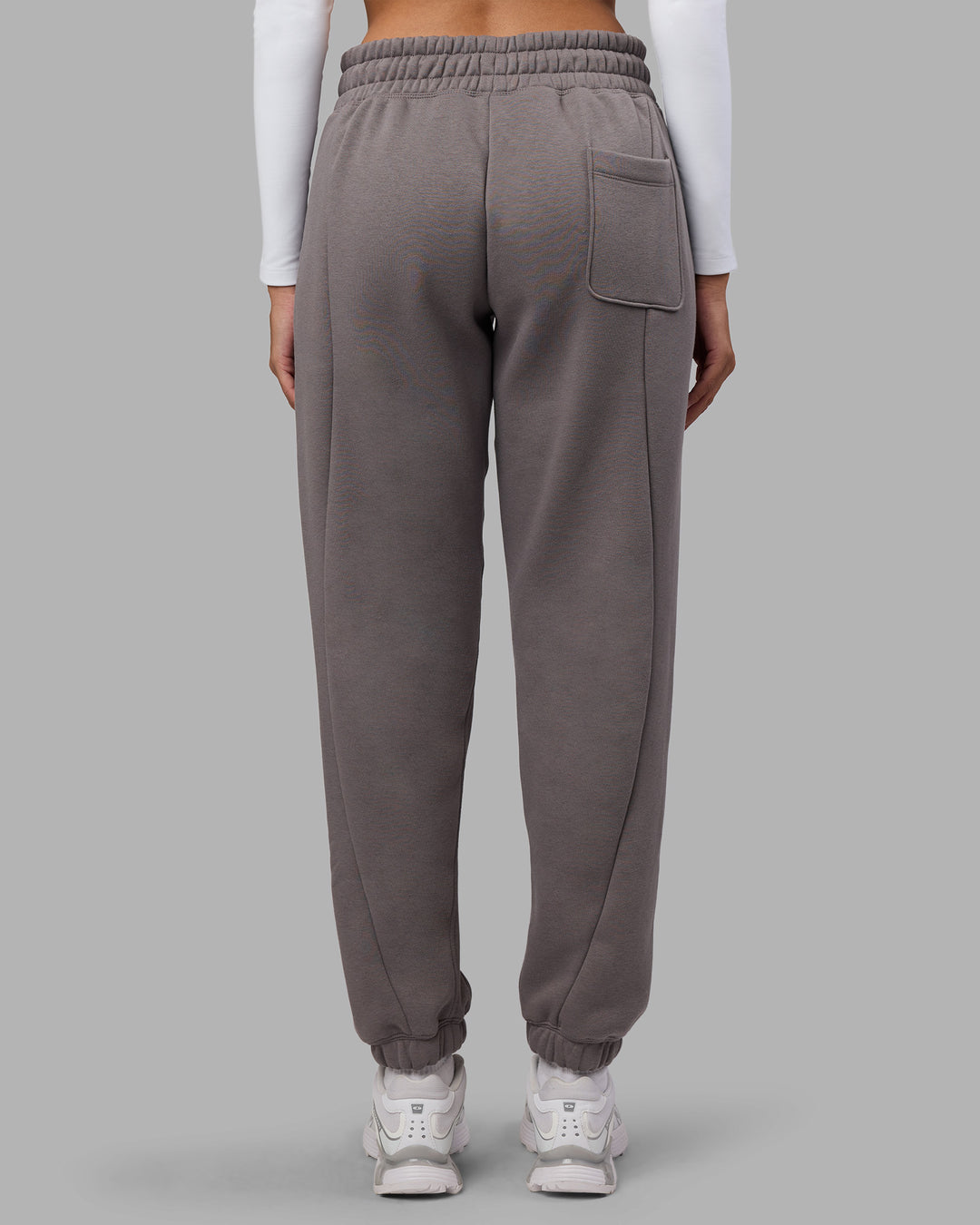 Woman wearing Stream Panel Track Pants - Storm Front | Model:Rhiley | Size:S - view 9