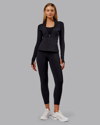 Woman wearing Stride Thermal Zip Through Jacket - Black | Model:Ella | Size:S | Thumbnail Index: 7