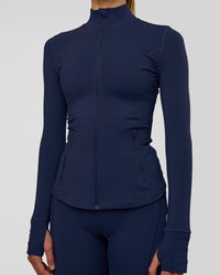 Woman wearing Stride Zip Through Jacket - Future Navy | Model:Evie | Size:S | Thumbnail Index: 6