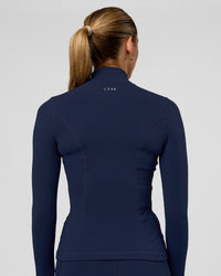 Woman wearing Stride Zip Through Jacket - Future Navy | Model:Evie | Size:S | Thumbnail Index: 2