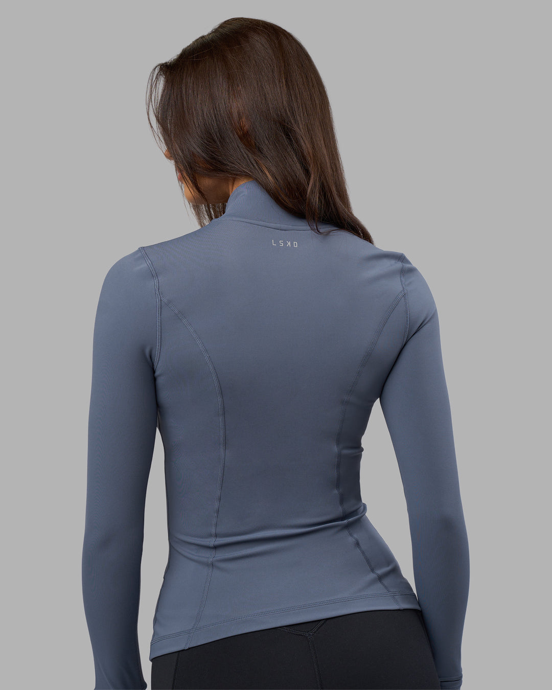 Woman wearing Stride Zip Through Jacket - Night Shadow | Model:Phoebe | Size:S - view 5