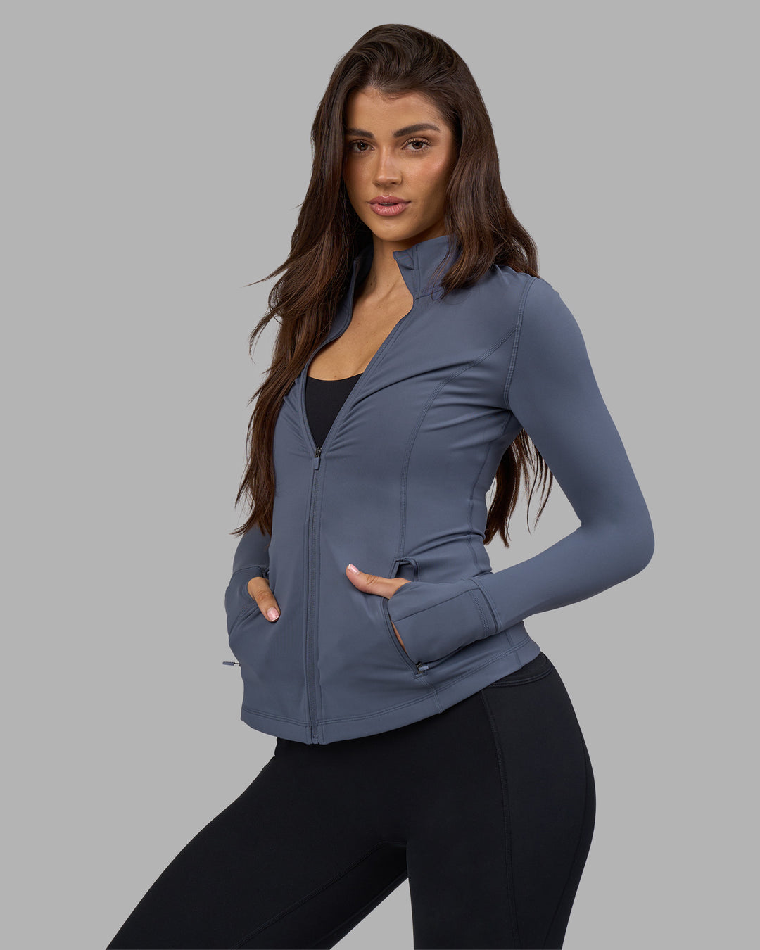 Woman wearing Stride Zip Through Jacket - Night Shadow | Model:Phoebe | Size:S - view 7