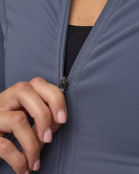 Woman wearing Stride Zip Through Jacket - Night Shadow | Model:Phoebe | Size:S | Thumbnail Index: 7