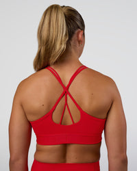 Woman wearing Strive Jacquard Sports Bra - Flame | Model:Sav | Size:S | Thumbnail Index: 0
