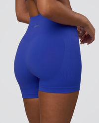 Woman wearing Surge Seamless High-Rise 4" Short - Power Cobalt | Model:Bianca | Size:S | Thumbnail Index: 3