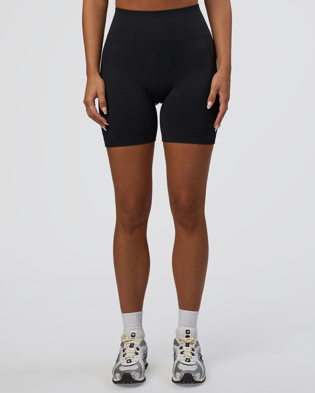 Woman wearing Surge Seamless High-Rise 6" Short - Black | Model:Bianca | Size:S - view 5