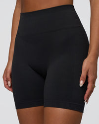 Woman wearing Surge Seamless High-Rise 6" Short - Black | Model:Bianca | Size:S | Thumbnail Index: 6