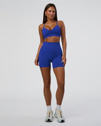 Woman wearing Surge Seamless High-Rise 6" Short - Power Cobalt | Model:Bianca | Size:S | Thumbnail Index: 1