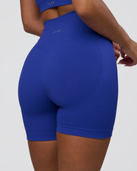 Woman wearing Surge Seamless High-Rise 6" Short - Power Cobalt | Model:Bianca | Size:S | Thumbnail Index: 2