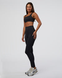 Woman wearing Surge Seamless High-Rise Full Length Legging - Black | Model:Bianca | Size:S | Thumbnail Index: 8