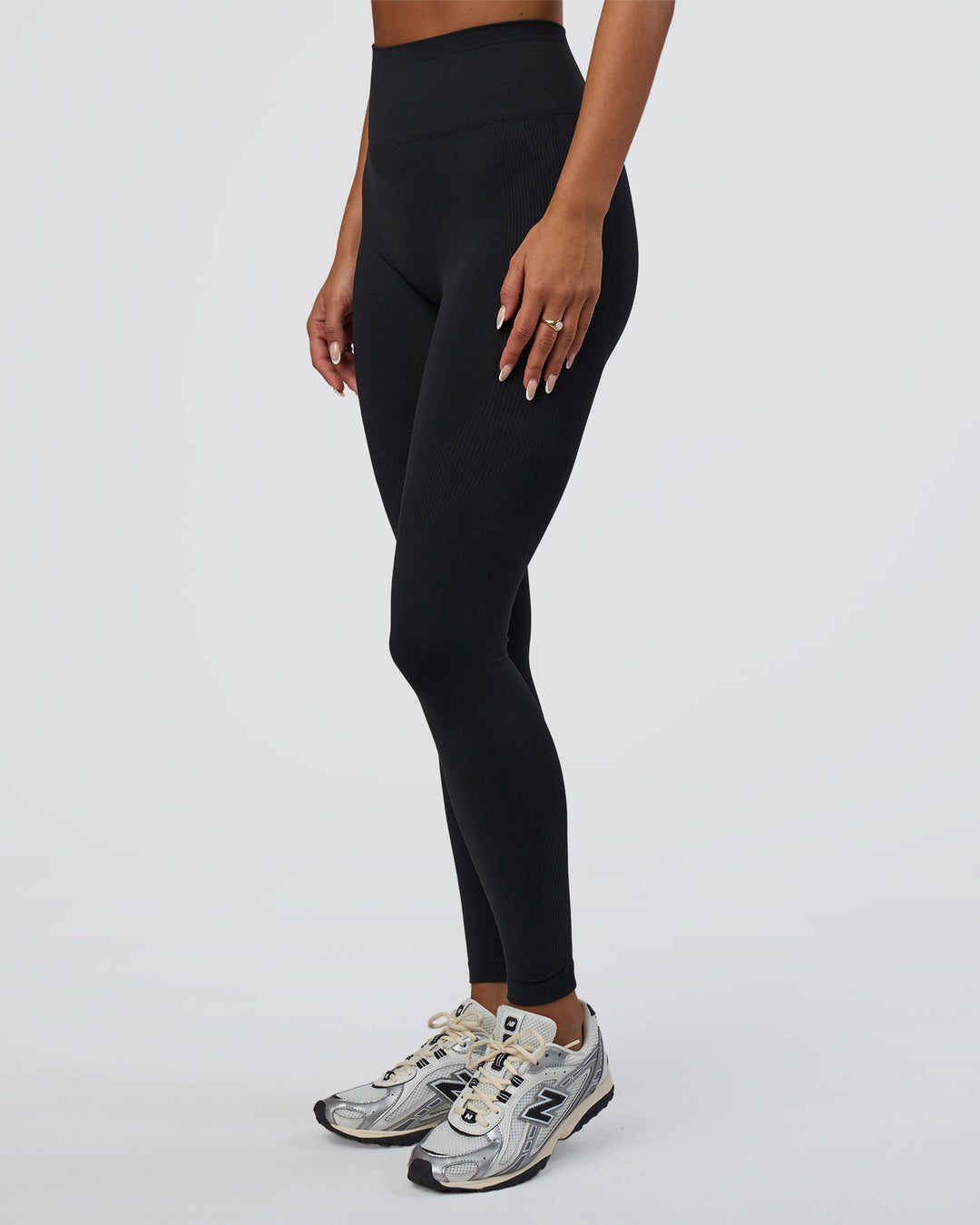 Woman wearing Surge Seamless High-Rise Full Length Legging - Black | Model:Bianca | Size:S - view 5
