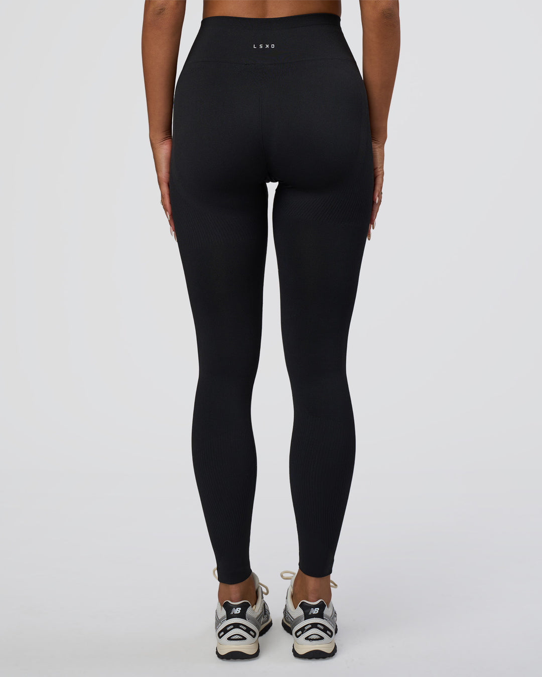 Woman wearing Surge Seamless High-Rise Full Length Legging - Black | Model:Bianca | Size:S - view 8