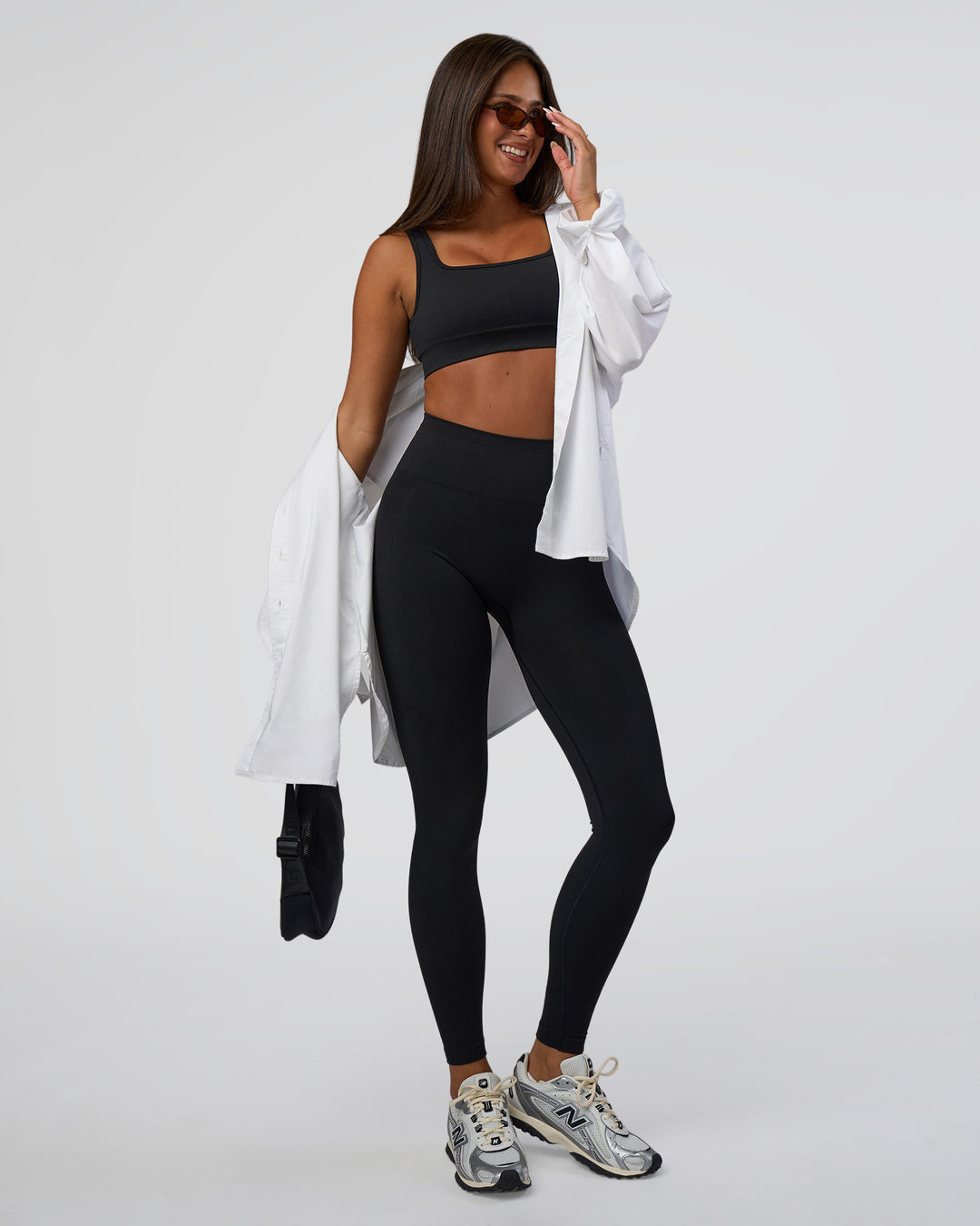 Woman wearing Surge Seamless High-Rise Full Length Legging - Black | Model:Bianca | Size:S - view 6