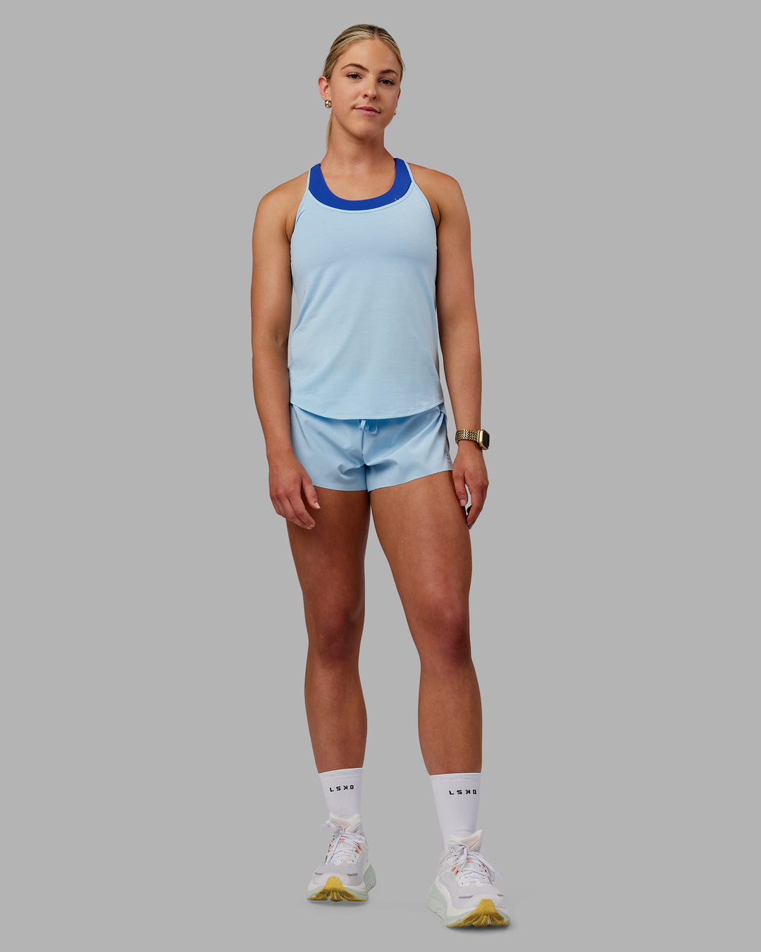 Woman wearing Swift Active Tank - Glacial Blue - view 7