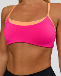Woman wearing Tempo Sports Bra - Ultra Pink-Cantaloupe | Model:Amity | Size:S | Thumbnail Index: 3