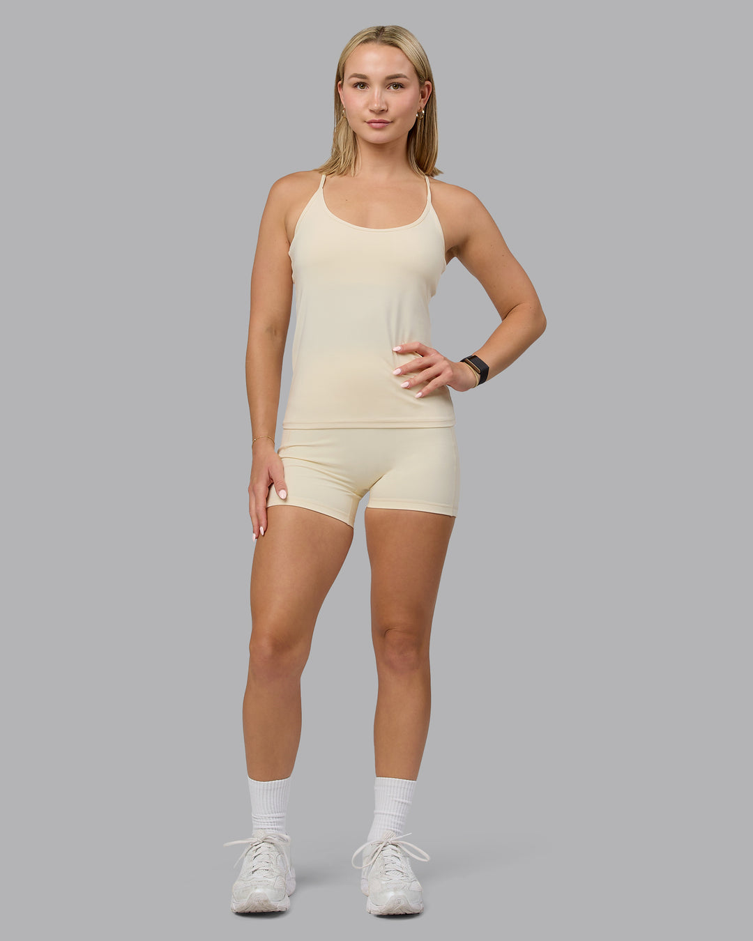 Woman wearing Transition CloudFLX Shelf Bra Tank - Ivory - view 6
