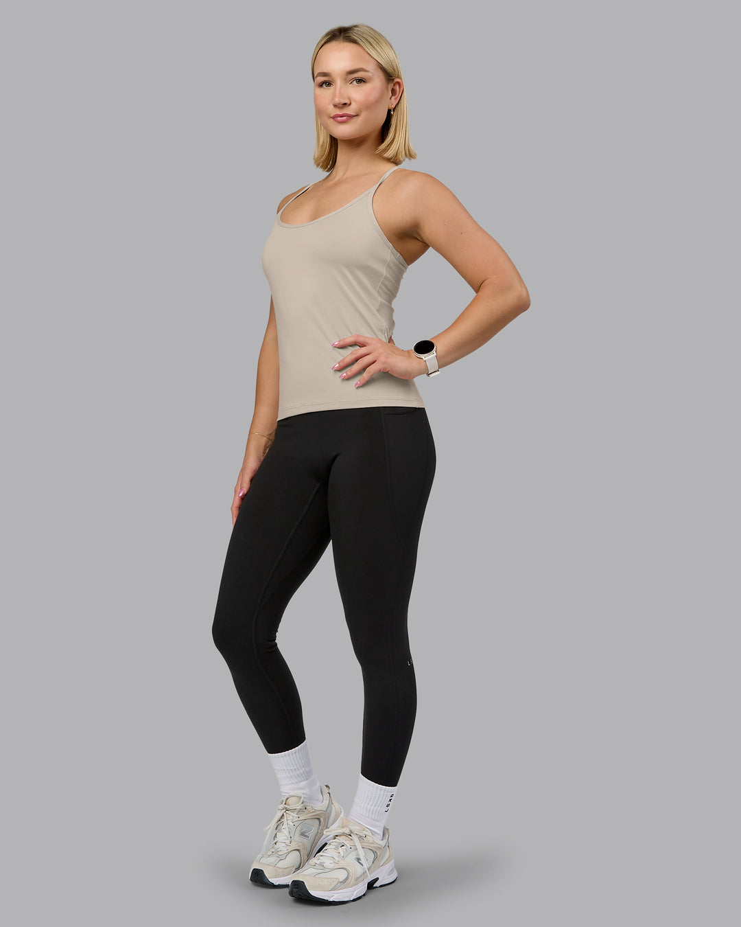 Woman wearing Transition CloudFLX Shelf Bra Tank - Shale Beige | Model:Halle | Size:S - view 5