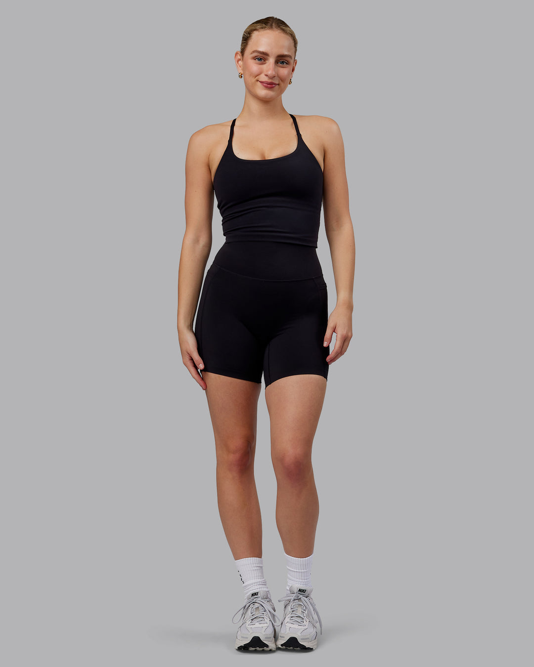 Woman wearing Twist Shelf Bra Tank - Black - view 7
