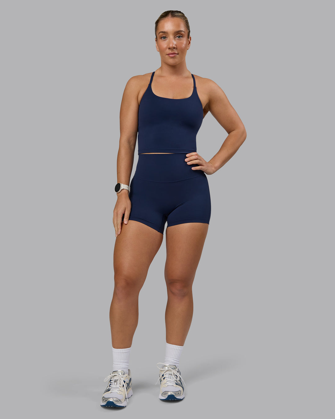 Woman wearing Twist Shelf Bra Tank - Future Navy - view 5