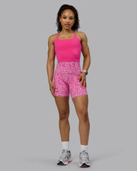Woman wearing Twist Shelf Bra Tank - Ultra Pink | Thumbnail Index: 8