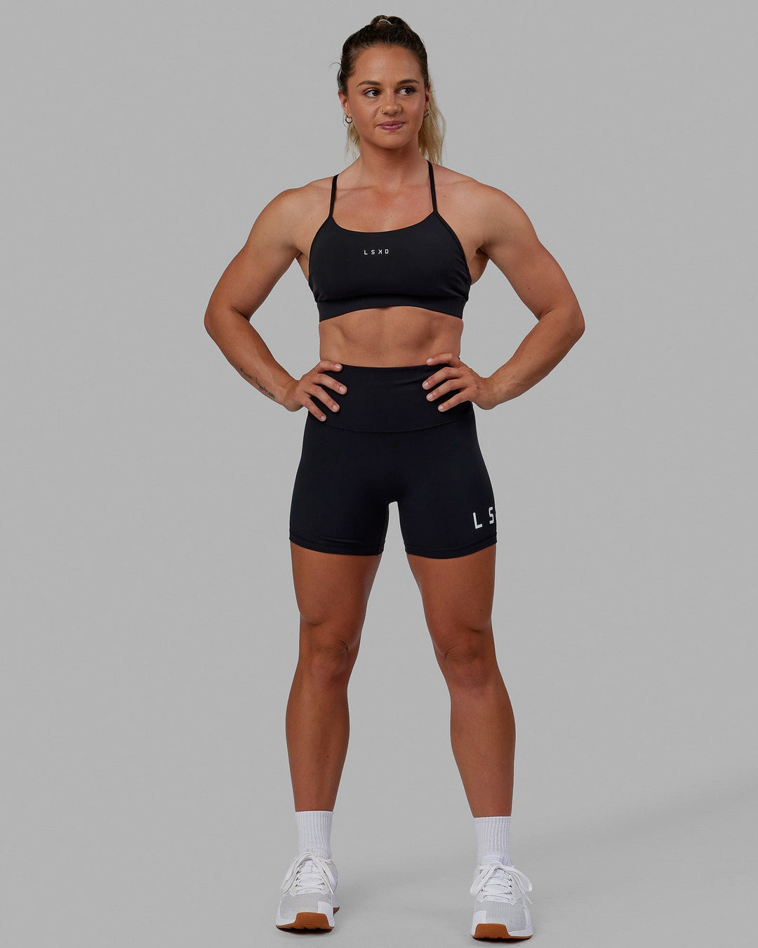 Woman wearing Lift Sports Bra - Black - view 4