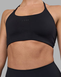 Woman wearing Twist Sports Bra - Black | Model:Sophie | Size:S | Thumbnail Index: 5