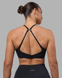 Woman wearing Twist Sports Bra - Black | Model:Sophie | Size:S | Thumbnail Index: 3