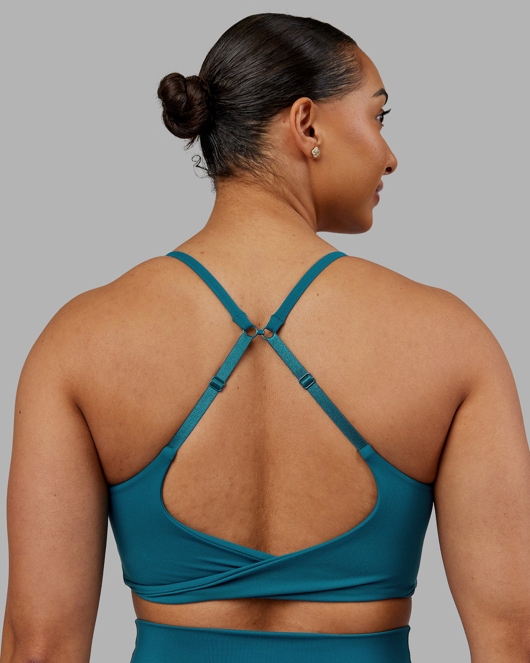 Woman wearing Twist Sports Bra - Blue Coral | Model:Ayla | Size:S - view 2