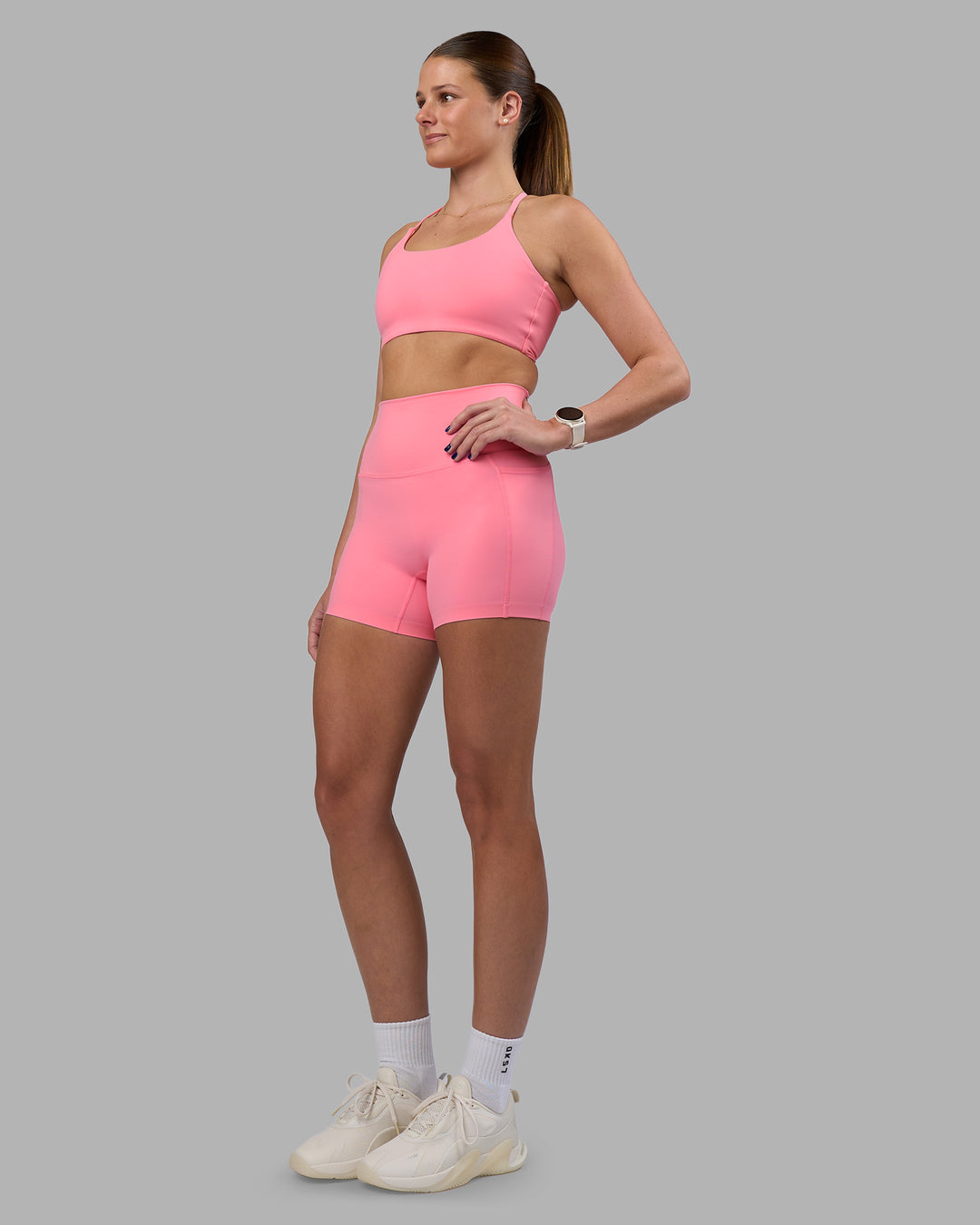 Woman wearing Twist Sports Bra - Candy Pink | Model:Phoebe | Size:S - view 4