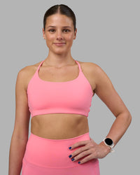Woman wearing Twist Sports Bra - Candy Pink | Model:Phoebe | Size:S | Thumbnail Index: 0