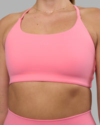 Woman wearing Twist Sports Bra - Candy Pink | Model:Phoebe | Size:S | Thumbnail Index: 7