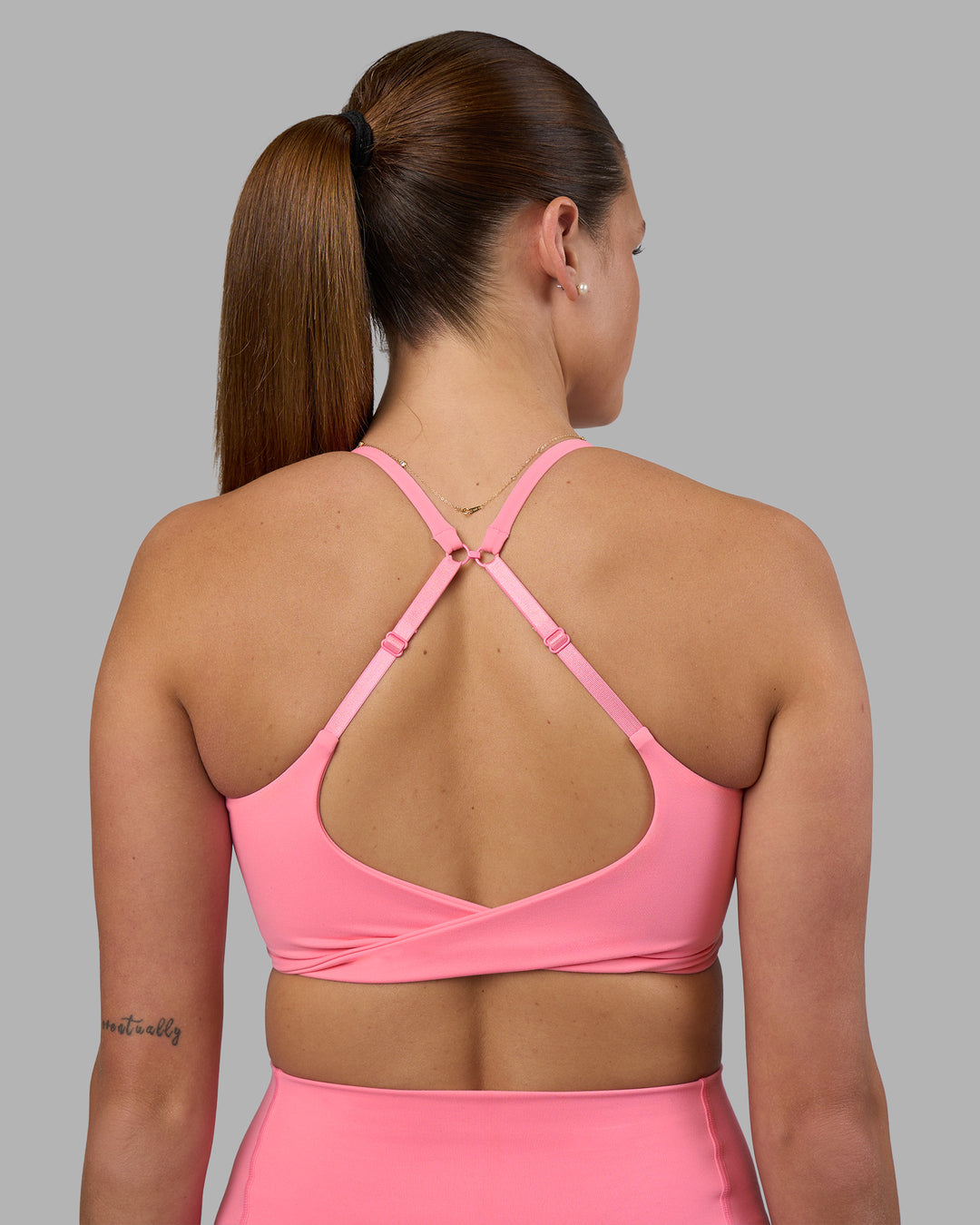 Woman wearing Twist Sports Bra - Candy Pink | Model:Phoebe | Size:S - view 7
