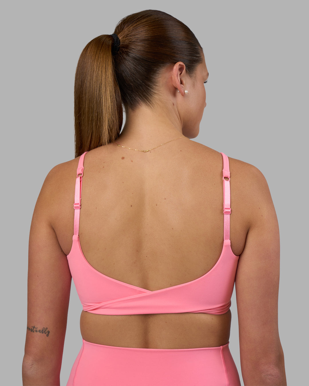 Woman wearing Twist Sports Bra - Candy Pink | Model:Phoebe | Size:S - view 5