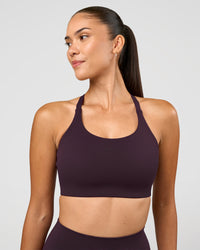 Woman wearing Twist Sports Bra D/DD/E - Midnight Plum | Model:Rhiley | Size:S | Thumbnail Index: 0