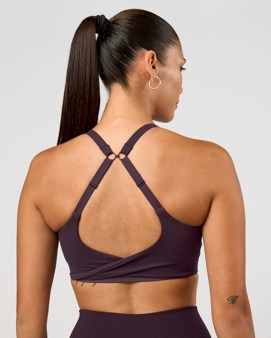 Woman wearing Twist Sports Bra D/DD/E - Midnight Plum | Model:Rhiley | Size:S - view 5