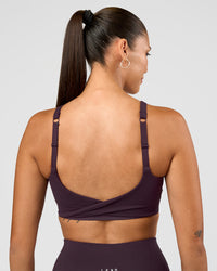 Woman wearing Twist Sports Bra D/DD/E - Midnight Plum | Model:Rhiley | Size:S | Thumbnail Index: 1