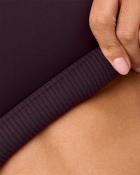 Woman wearing Twist Sports Bra D/DD/E - Midnight Plum | Model:Rhiley | Size:S | Thumbnail Index: 5