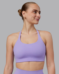 Woman wearing Twist Sports Bra D/DD/E - Violet Ray | Model:Lillie | Size:S | Thumbnail Index: 1