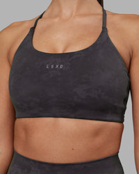 Woman wearing Twist Sports Bra - Dark Storm Wash | Model:Rhiley | Size:S | Thumbnail Index: 3