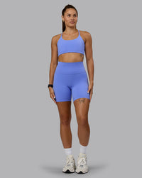 Woman wearing Twist Sports Bra - Indulgent Blue | Thumbnail Index: 6