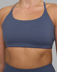 Woman wearing Twist Sports Bra - Night Shadow | Model:Phoebe | Size:S | Thumbnail Index: 4