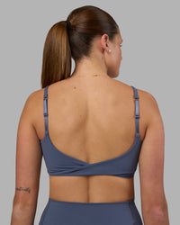 Woman wearing Twist Sports Bra - Night Shadow | Model:Phoebe | Size:S | Thumbnail Index: 0