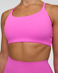 Woman wearing Twist Sports Bra - Ultra Fuchsia | Model:Myrte | Size:S | Thumbnail Index: 3
